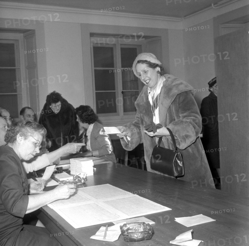 First voting about the federal women's suffrage. Here are women from Peseux in the French part of Switzerland voting.