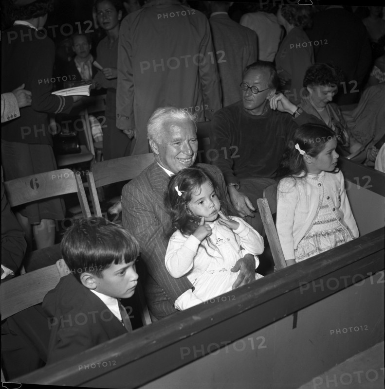 Charles Chaplin with his children at Circus Knie, 1953.