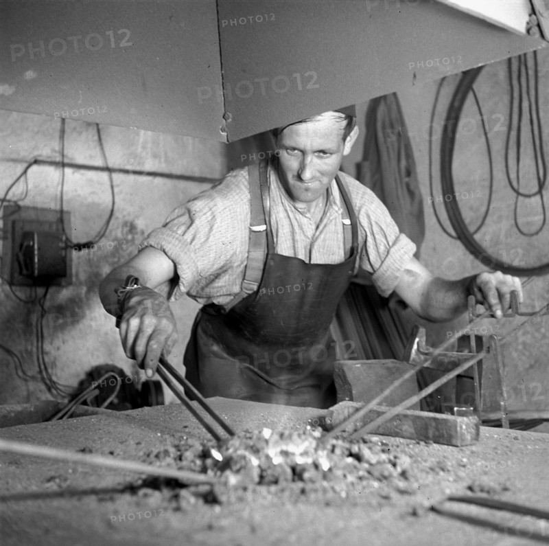 Forge, nailer making nails; 1940