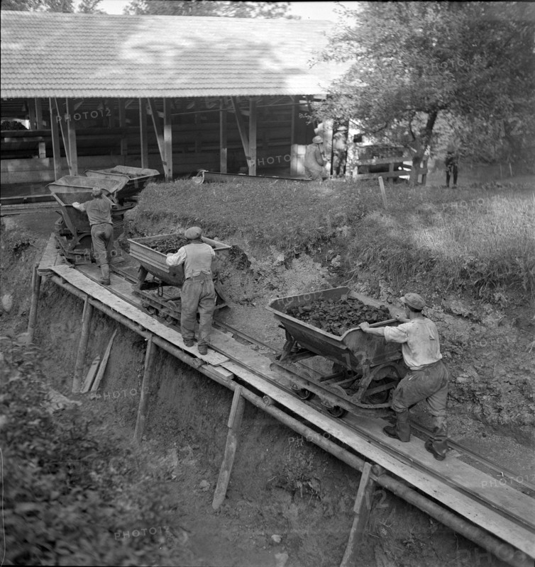 miners; miner car in coal mine; 1941
