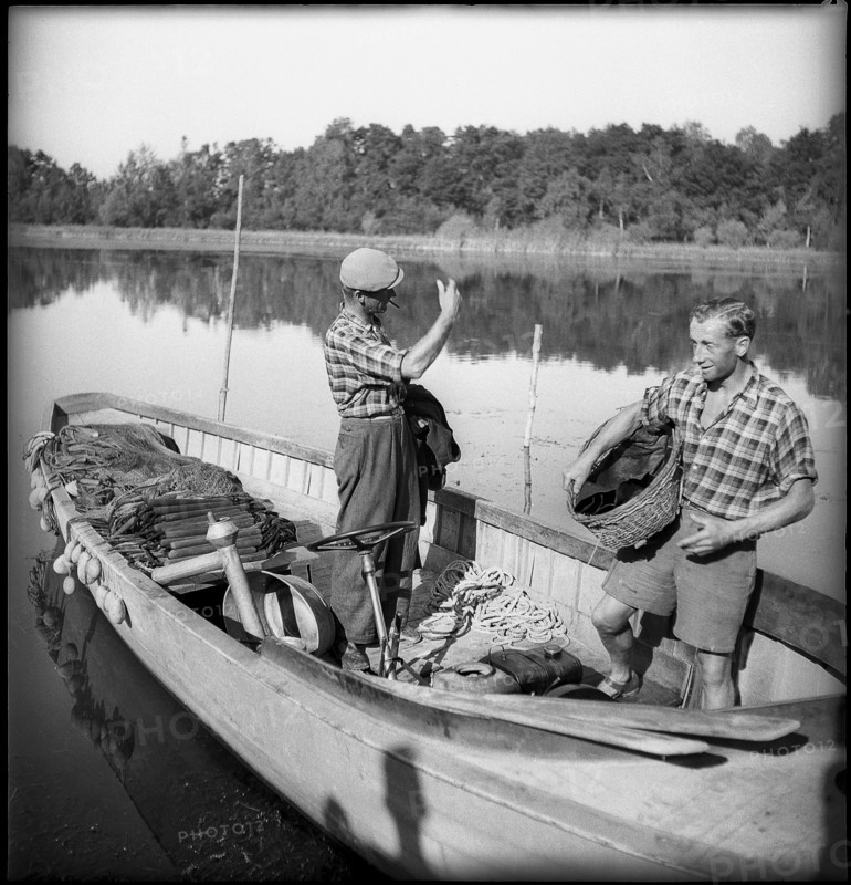 Swiss fishermen on Lake Constance on fishing boat 1945