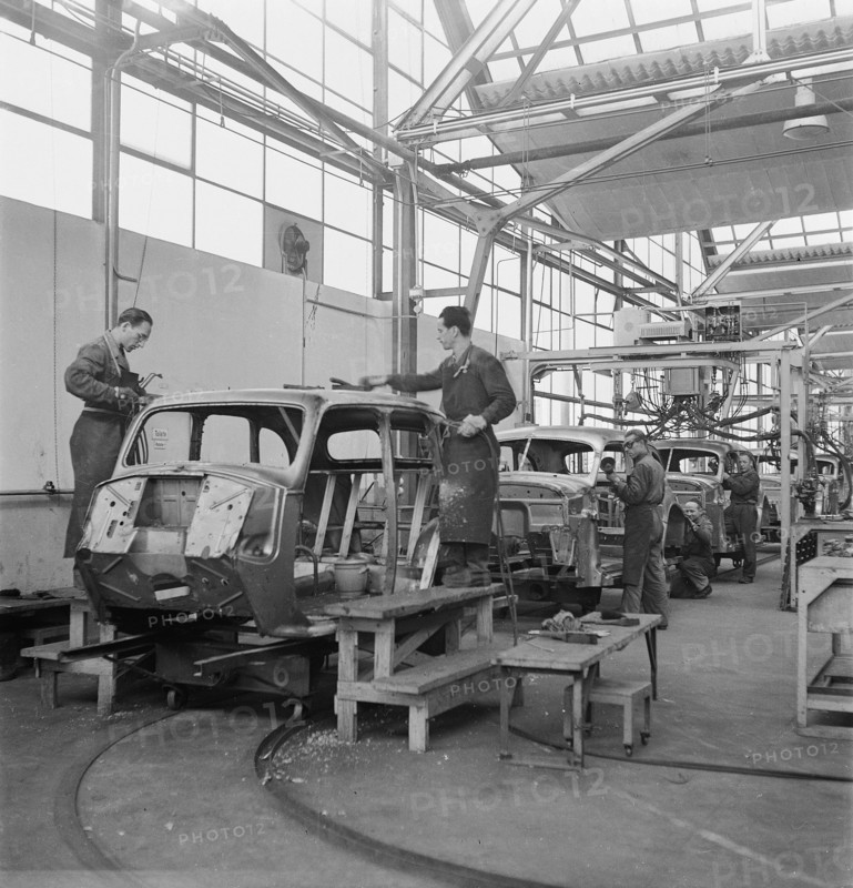 coaching work; assembly hangar; General Motors 1946