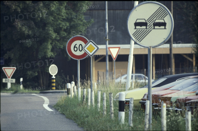 Road sign: No overtaking at the end