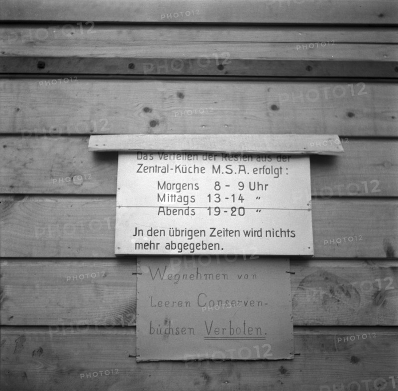 Announcement outside of military kitchen; 1940