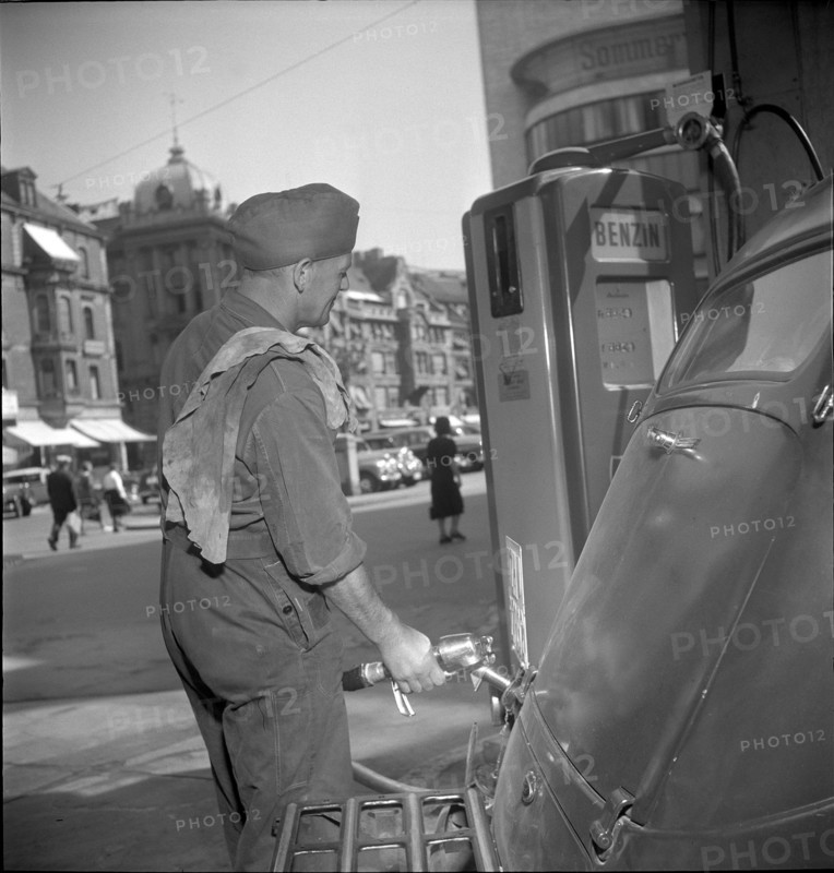 Filling Station Attendant Filling the Fuel Tank, 1950