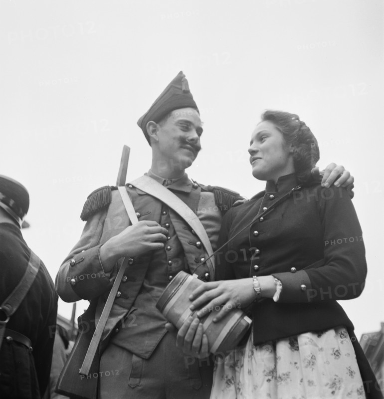 Couple at carnival parade in Payerne, 1946