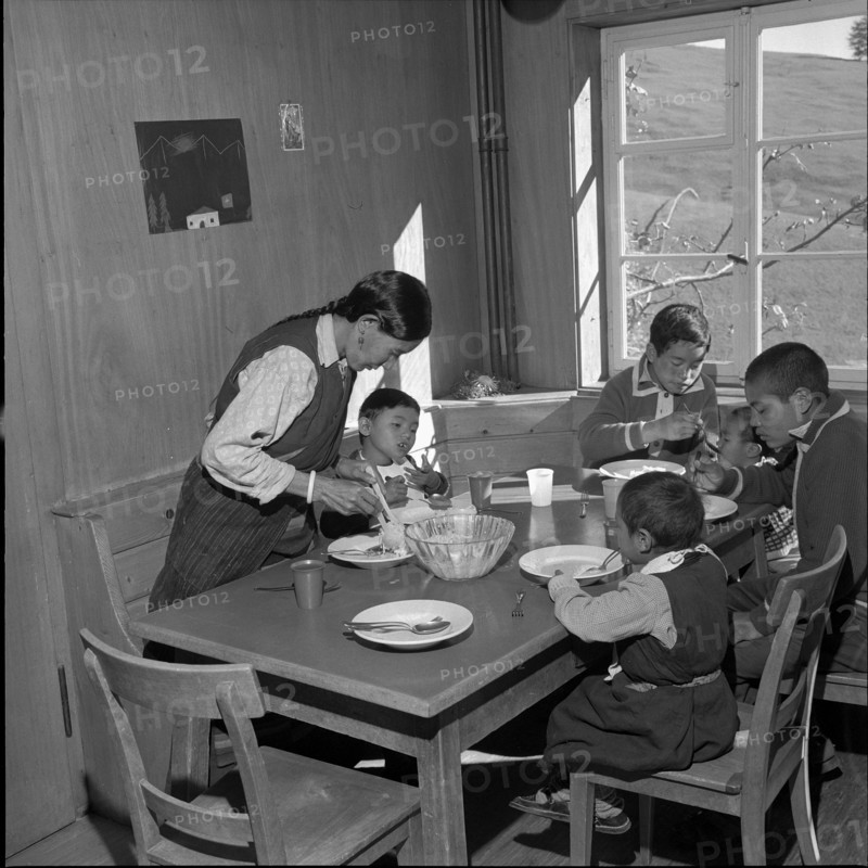 Tibetan refugees at lunch, underwater 1961