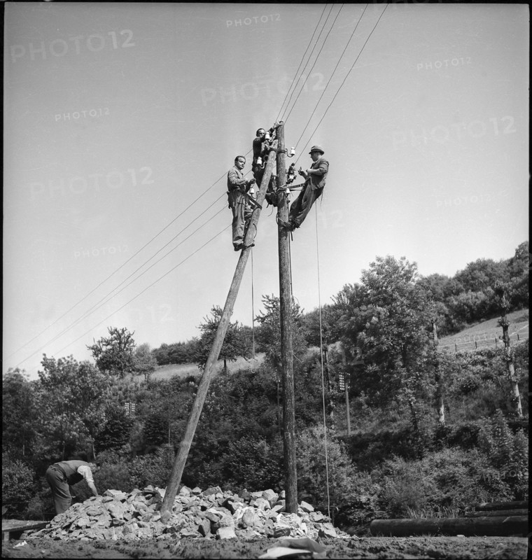 Men on Telephone Pole, 1939