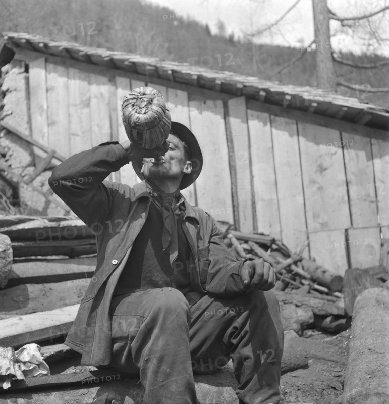 Valais, Miner having a break; Goltschried coal mine; 1941