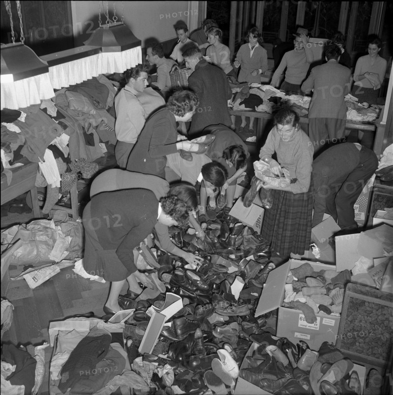 Students sorting clothing for emergency aid in Hungary, Lausanne 1956
