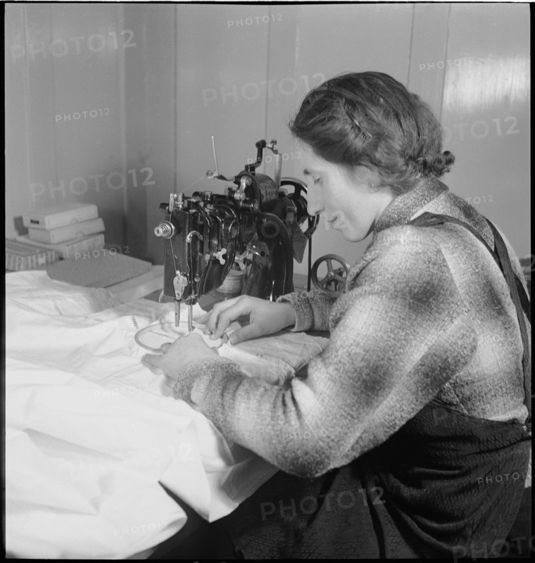 Home embroideress at work, 1942