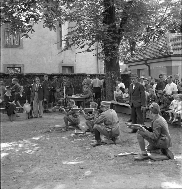 Boys shooting with crossbows, 1941