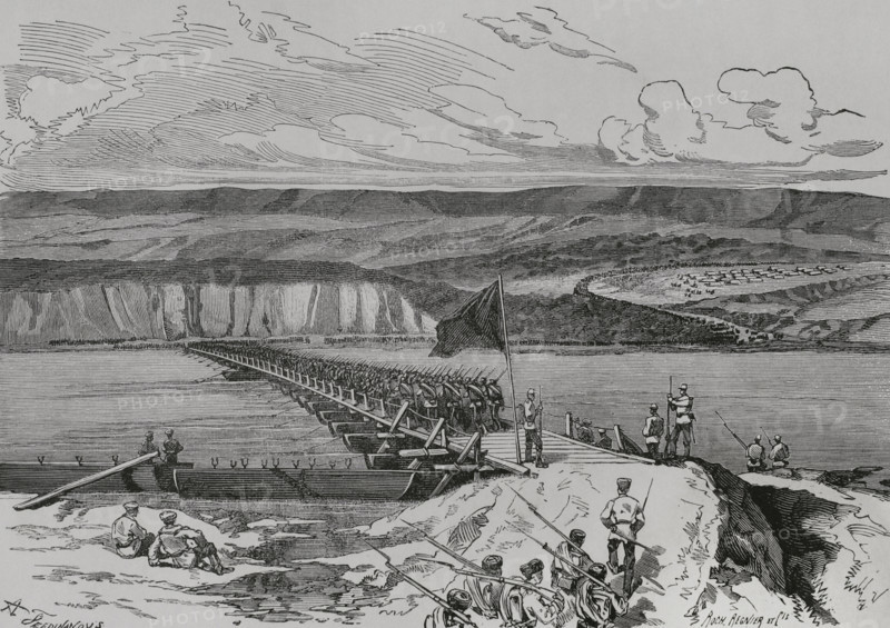 Russo-Turkish War (1877-1878). Crossing the Danube by the Russian troops. Bridge of Simnitza, June 26, 1877. Two bridges supported on trestles were laid over the lagoons. Engraving by A. Ferdinandus and Roch Regnier et Cie. ""La Guerra de Oriente"" (The Russo-Turkish War). Volume I. 1877.