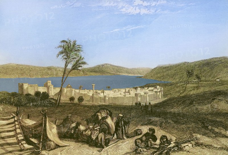 Tiberias and the Sea of Galilee. Engraving by Emile Rouargue. Later colouration. ""La Tierra Santa y los lugares recorridos por los profetas, por los apostoles y por los cruzados"" (The Holy Land and the sites traversed by the prophets, by the apostles and by the crusaders). Published in Barcelona by the printing house of Joaquin Verdaguer, 1840.
