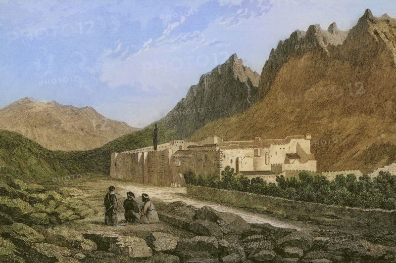 Saint Catherine's Monastery. Located at the foot of Mount Sinai. Engraving by Ransonnette. Later colouration. ""La Tierra Santa y los lugares recorridos por los profetas, por los apostoles y por los cruzados"" (The Holy Land and the sites traversed by the prophets, by the apostles and by the crusaders). Published in Barcelona by the printing house of Joaquin Verdaguer, 1840.