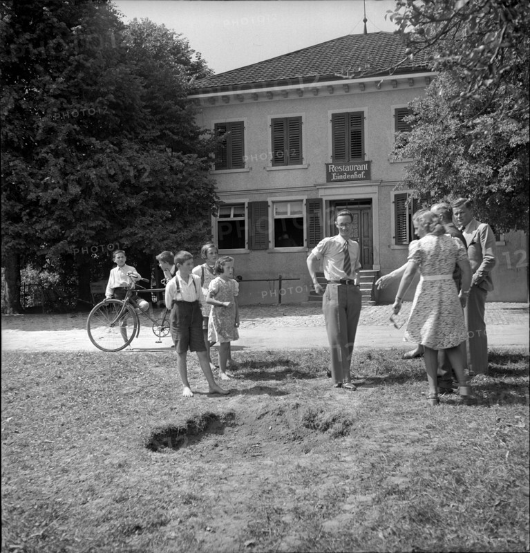WWII: Bombing in Switzerland; impact, crater, 1943