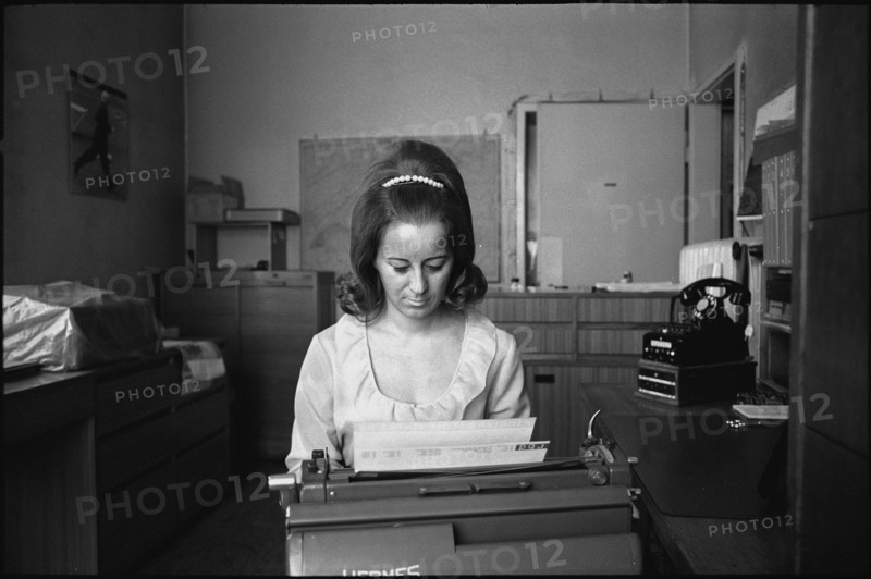 Secretary writing, 1969