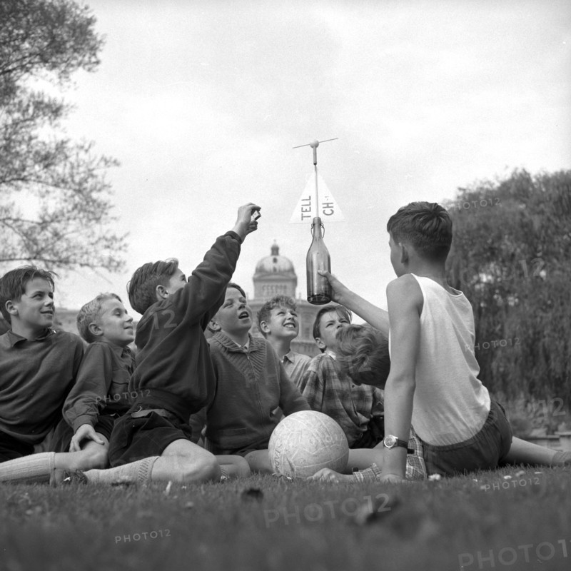 Boys launching their toy satellite Bip I; Bern 1957