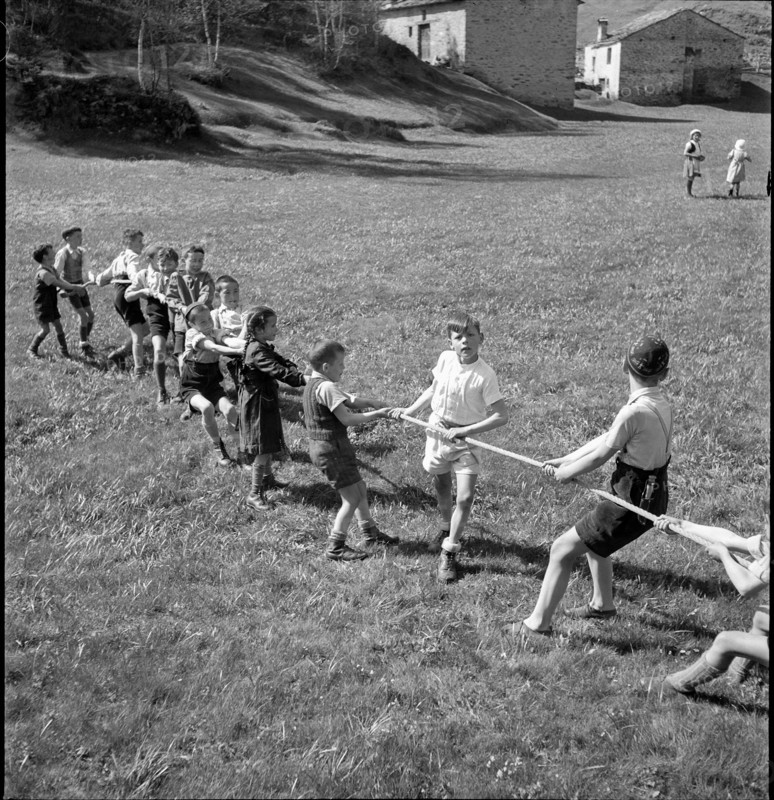 Children playing tug of war, 1942