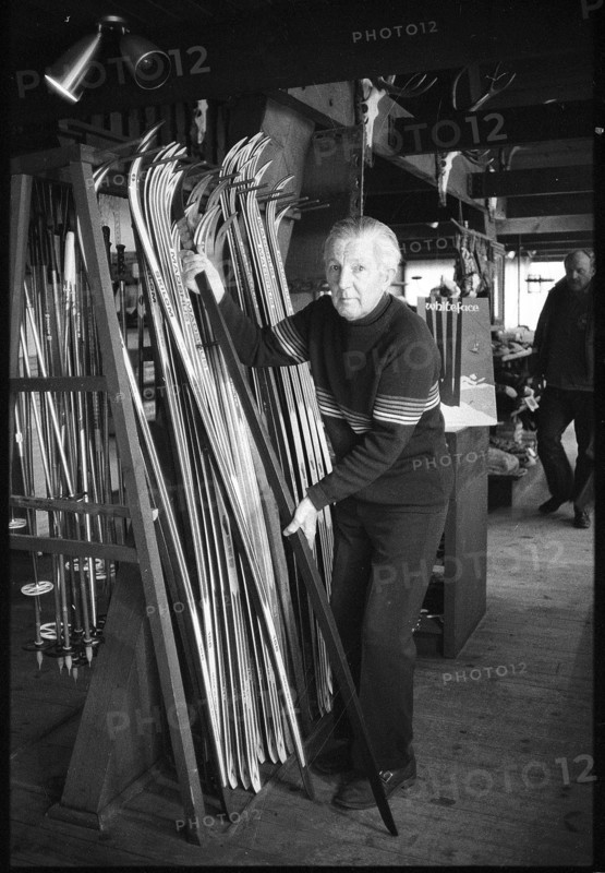 Swiss former skier Walter Prager in his ski shop, 1980