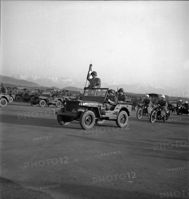 Flag bearer on Jeep, Emmen 1949