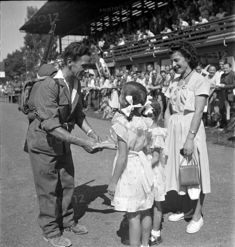 Gun runner with girl, Bern Gun Run 1949