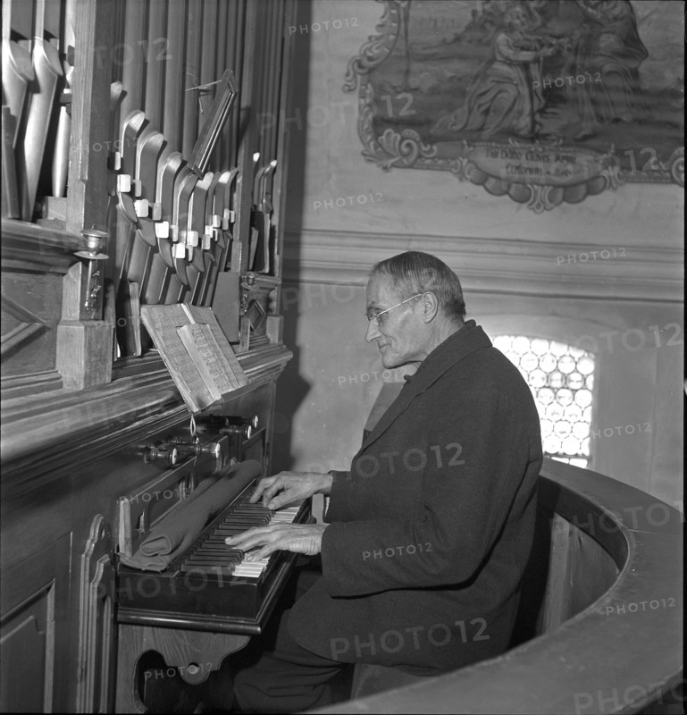 Organist at the organ, 1945