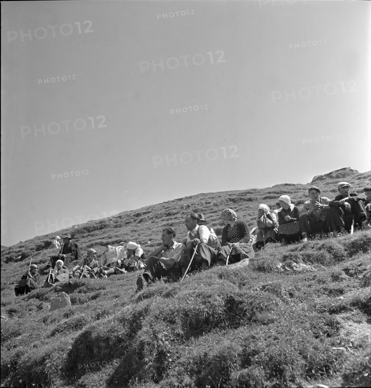 Farmers resting after the cattle drive, Valais 1942