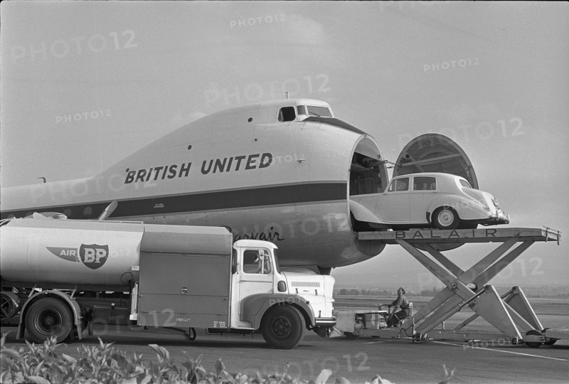 Rolls Royce being loaded onto an airplane, 1966