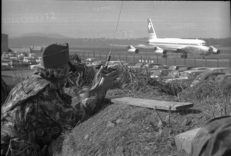 Soldier in observation trench, Zurich Airport 1970