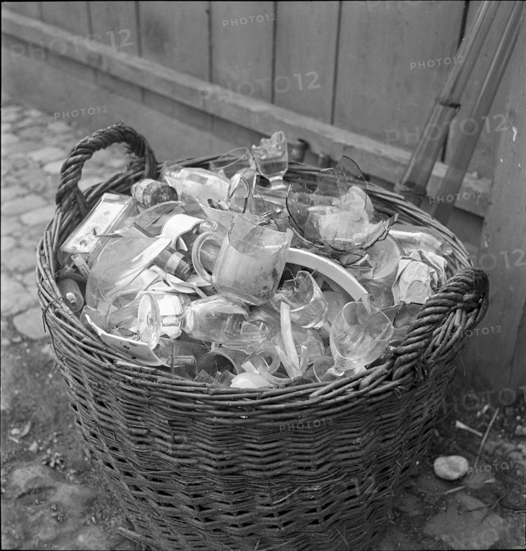 Basket full of used glass. 1942