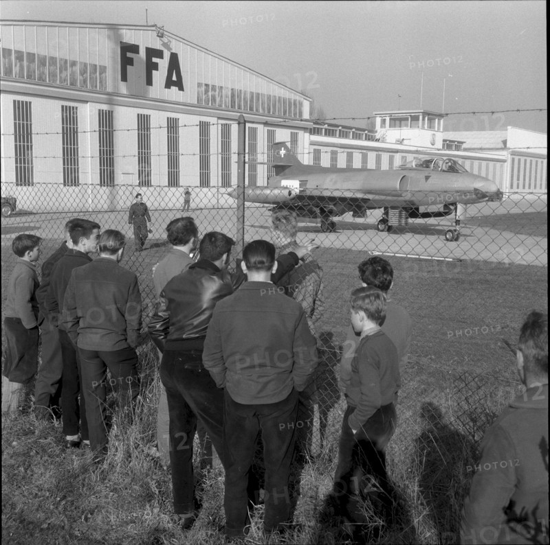 Curious onlooker with P16 military jet, Altenrhein 1960
