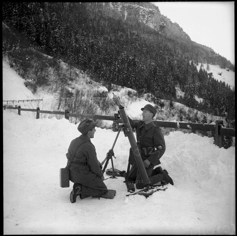 Avalanche in Vals, boys carrying parcels with solidarity donations. 1951