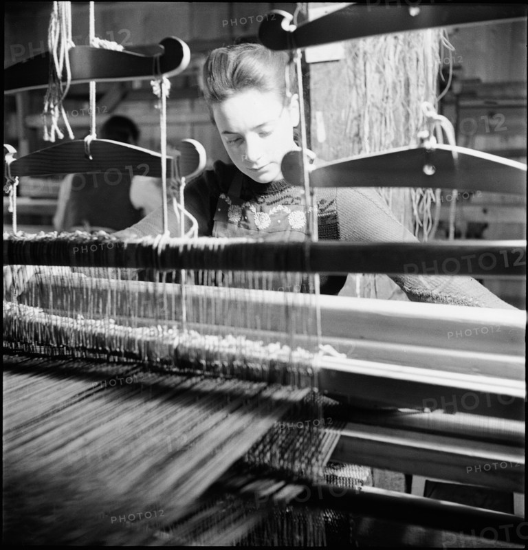 Woman weaving in a weaving room in Münstertal, 1946