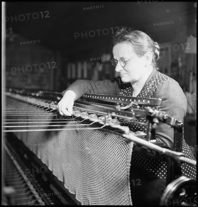 Embroiderer at work, 1945