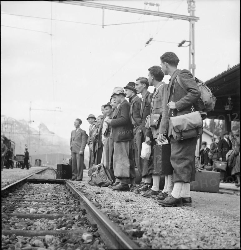 Apprentices waiting for train; 1943