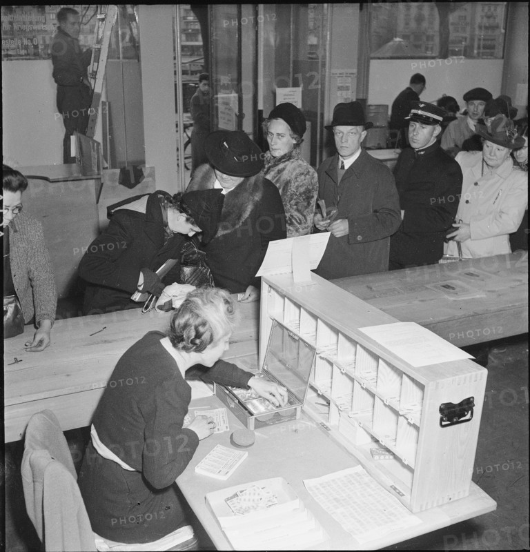 Standing in line for soup, ration card; 1945