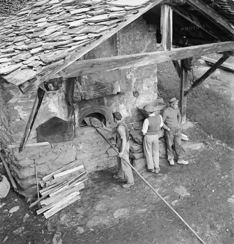 Baking bread in a Valais village, 1941