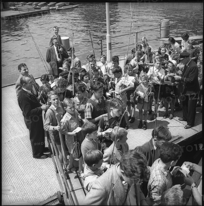 Zurich children competing in a fishing contest in Rapperswil, return journey 1953