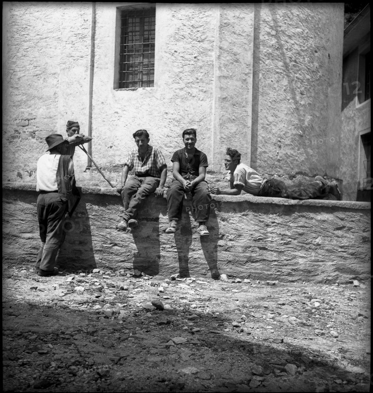 People on a wall in Brione, Ticino, 1942