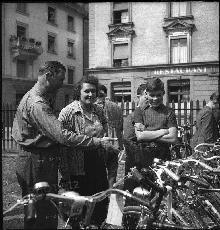 Family at a bicycle market in Zurich 1948