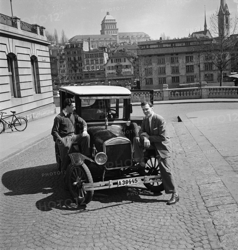 Two men with an old Ford on a European trip, 1949