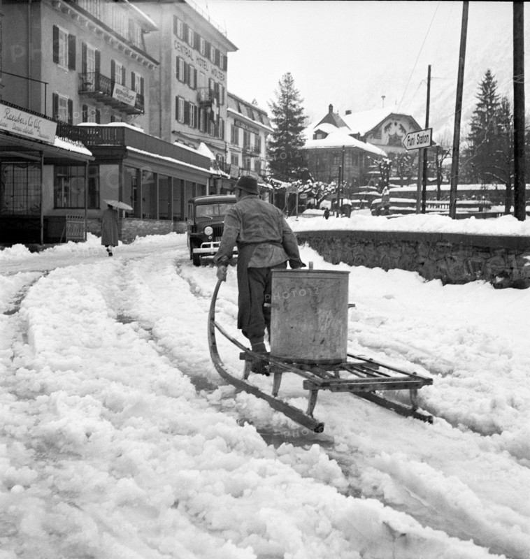Grindelwald, man pulling sledge; 1950.