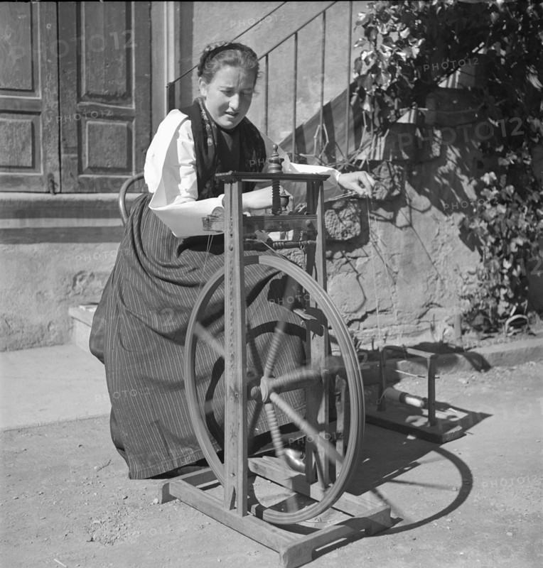 Woman spinning yarn, 1941.