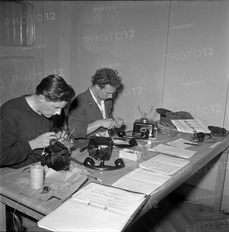 Geneva, the Four Great Powers conference: setting up the phone system at press centre; 1955.