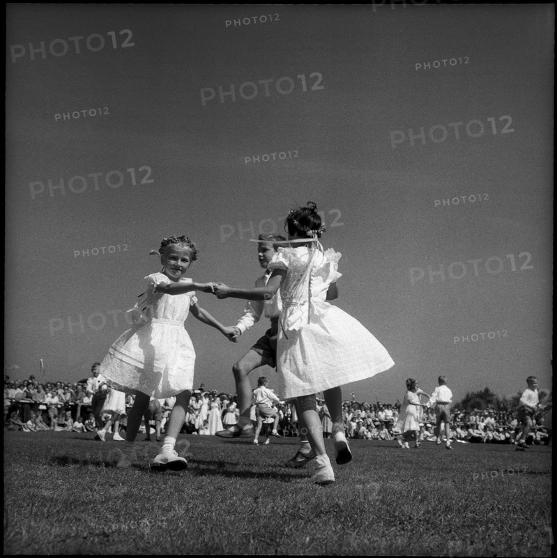 Children dancing at the children's party in St. Gallen, 1955.