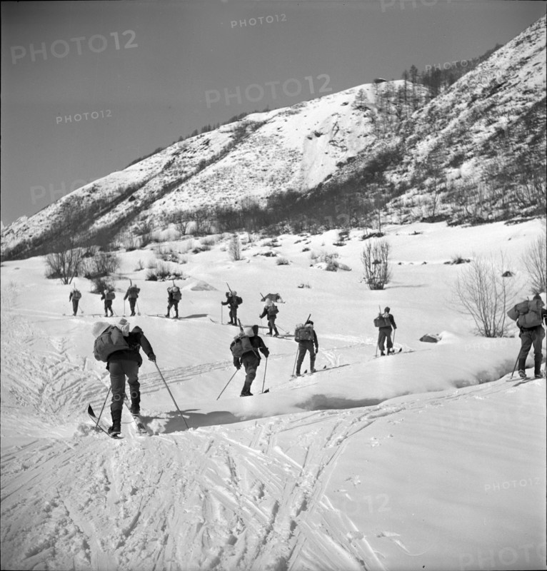 Soldiers ski-hiking  in the Lötschental; 1940.