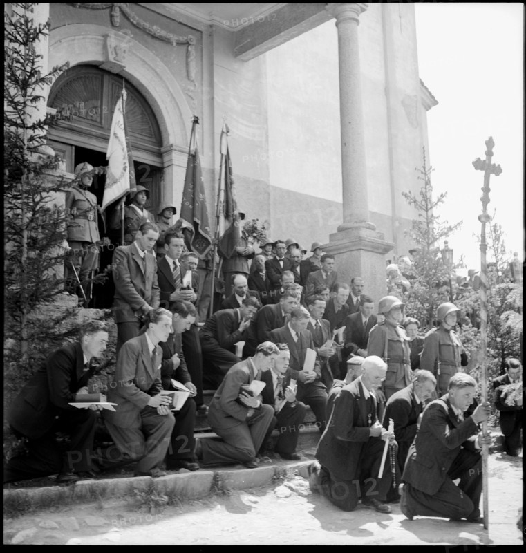 Villagers praying on Corpus Christi in the Valais village Ayent, 1943.