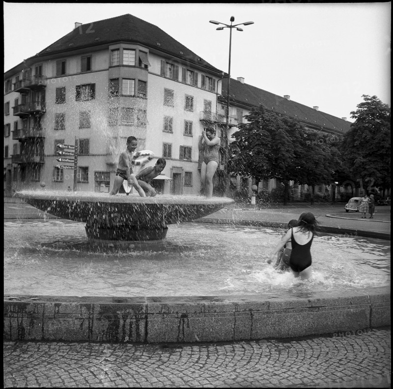 Children playing in a fountain in Zurich, 1967.