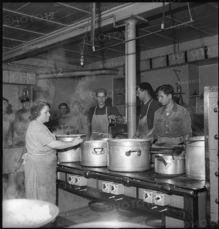 Refugees; kitchen; serving hatch; 1945.